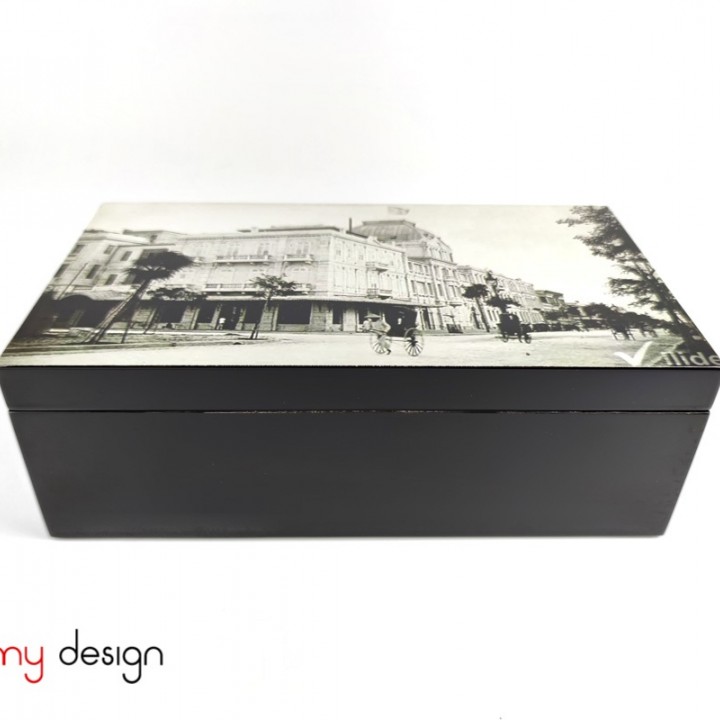 Black rectangle lacquer box attached with Metropole hotel picture